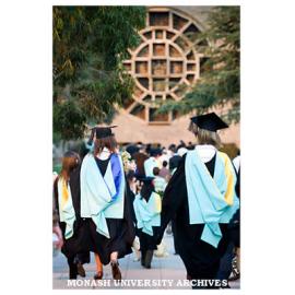 Graduates walking to Robert Blackwood Hall, Clayton campus