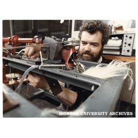 Research Assistant Bob Mair working on the development of shearing blades.