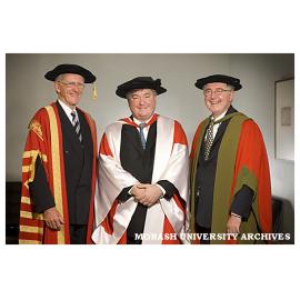 Chancellor Mr Jerry Ellis (left) with Dr Michael Wooldridge and Professor Ed Byrne, Dean of Medicine, after award of honorary Doctor of Laws