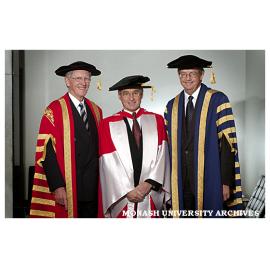 Emeritus Professor Peter Darvall (centre)after receiving honorary Doctor of Laws with Chancellor Mr Jerry Ellis and Vice-Chancellor Professor Richard Larkins