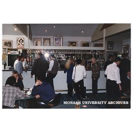 Patrons in the Monash University Club bar