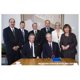 Signing of Memorandum of Understanding with the University of Belgrade, Serbia, with Vice-Chancellor Richard Larkins and Rector Professor Dr Dejan Popovic seated at table.