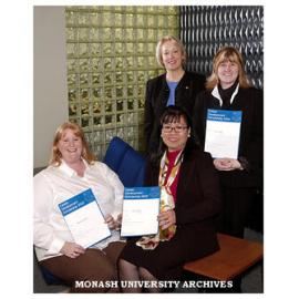 Career development scholarships winners Ms Rebecca Hillman and Ms Helen Dinh (seated) with Ms Alison Crook and Ms Kerrie Cake.