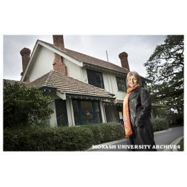 Helen O'Shea, granddaughter of original owner, outside Building 65 (the former Vice-Chancellor's residence)