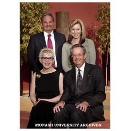Launch of the Inclusive Practices: Disability Plan. Professor Graham Webb; Ms Amber Collings, (senior disability liaison officer) (standing); Professor Richard Larkins; and Ms Kay Gardner, Monash Equity and Diversity Centre manager.