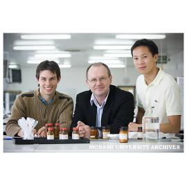 Senior Deputy Vice-Chancellor Professor Stephen Parker (centre) with pharmacy students Mr Adrian Weeks (left) and Mr Paul Bui