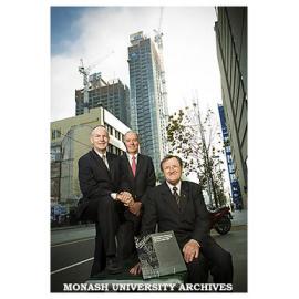 Mr John Jackson (left), Professor Colin Chapman and Mr Alistair Lloyd at unveiling of plaque in Swanston Street to celebrate 125 years of the Victorian College of Pharmacy.