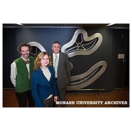 Assoc. Professor Robert Nelson (left)and Professor Rob Willis with artist Sherrie Knipe in front of wall sculpture 'In Sink'
