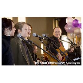 Professor Stephen Parker and his daughters, Alice, Hannah and Ruth, performing at the 10th annual Administrative Support Network Breakfast.