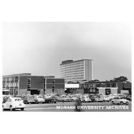 Looking east from the car park to Science buildings with Robert Menzies School of Humanities in background.