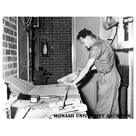 Senior Technical Officer David Anderson working in tunnel under Chemistry building.