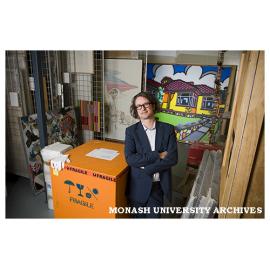 Max Delaney, Director of Monash University Museum of Art (MUMA), with some of the art works from the University's collection of contemporary art in the store room at Clayton Campus.