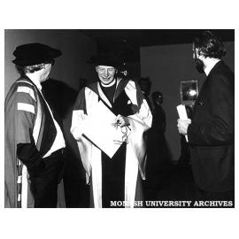 Honorary Doctor of Laws Sir Frank Woods (centre) with Chancellor Sir Richard Eggleston (left)