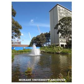 Pond with Alexander Theatre undergoing renovation (left) and Menzies Building (right), Clayton campus