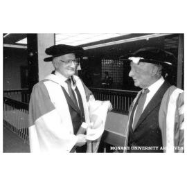 Honorary graduate Will Bailey with Chancellor Sir George Lush (right)