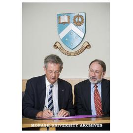Vice-Chancellor Richard Larkins and Dean of Science Rob Norris signing the Talloires Declaration