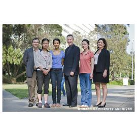 Deputy Vice Chancellor (Education) Professor Adam Shoemaker (centre) with Professor Constant Mews (left) & participants in Parliament of the World's Religions event, Sheng Gu, Natalie Ngu, Karen Zhang & Stephanie Rocke