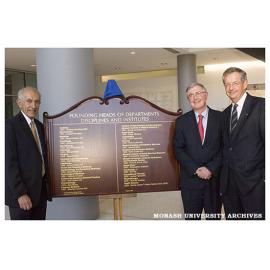 Professor David de Kretser, Professor Ed Byrne and Vice-Chancellor Professor Richard Larkins at unveiling of honour board in the Faculty of Medicine, Nursing and Health Sciences