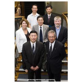 Vice Chancellor Professor Richard Larkins and Professor Wang Xiao Min, Vice-President of China Capital Medical University, with delegates and Monash staff