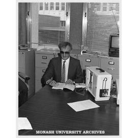 Ron McCallum of the Faculty of Law using a personal reader to convert text into speech