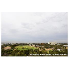 Raised view of Clayton campus from east encompassing sports field and Menzies Building