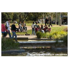 Students by pond in Forum
